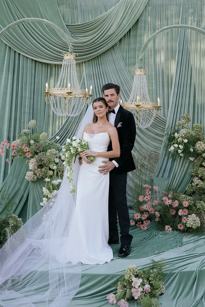 A Dreamy Draped Ceremony Backdrop Anchors This Sage, Ivory, and Blush Wedding Editorial